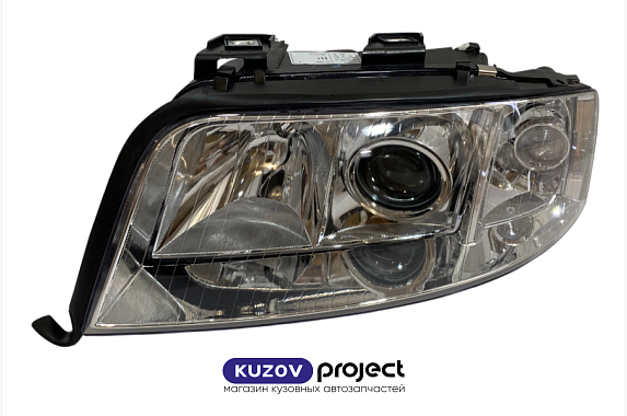 Фара левая под электрический корректор Audi A6 2001-2004 (TYC / Тайвань)
